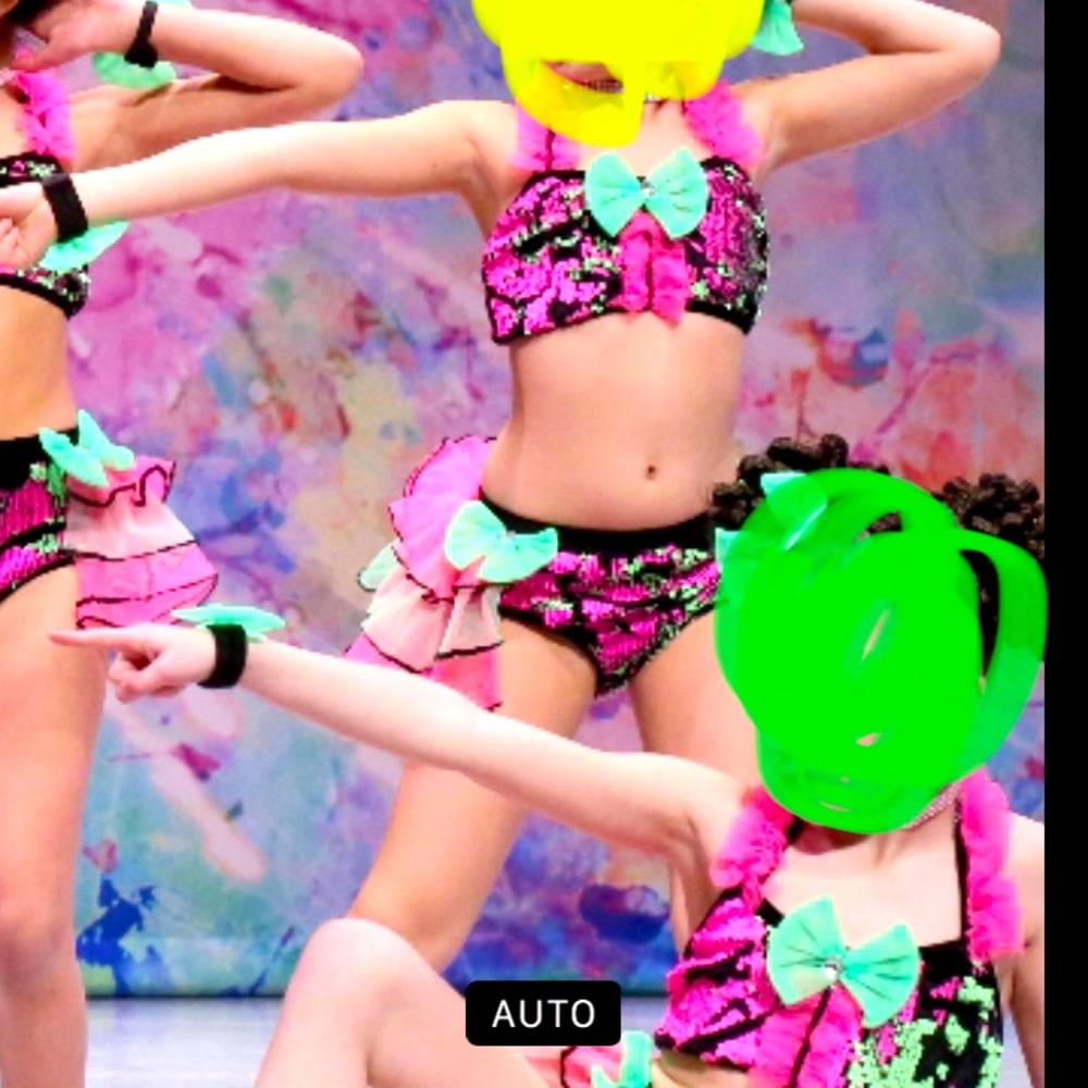 Weissman IC two piece colorful costume with bows for arms and hair.
